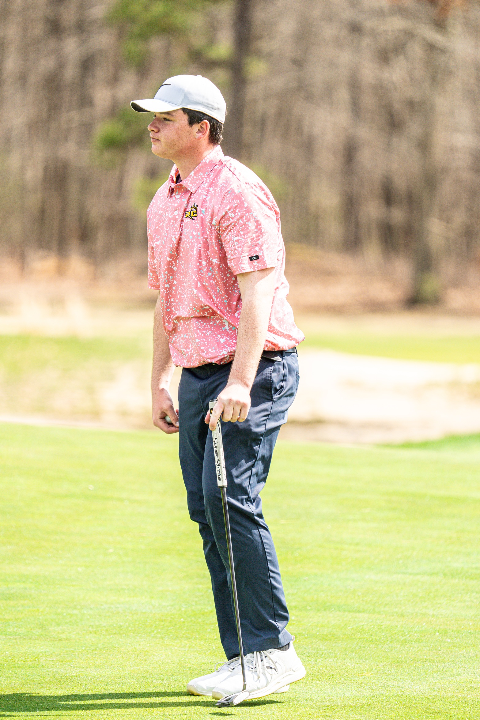 Chase Adomaitis led all mens golfers with a low score of 74
